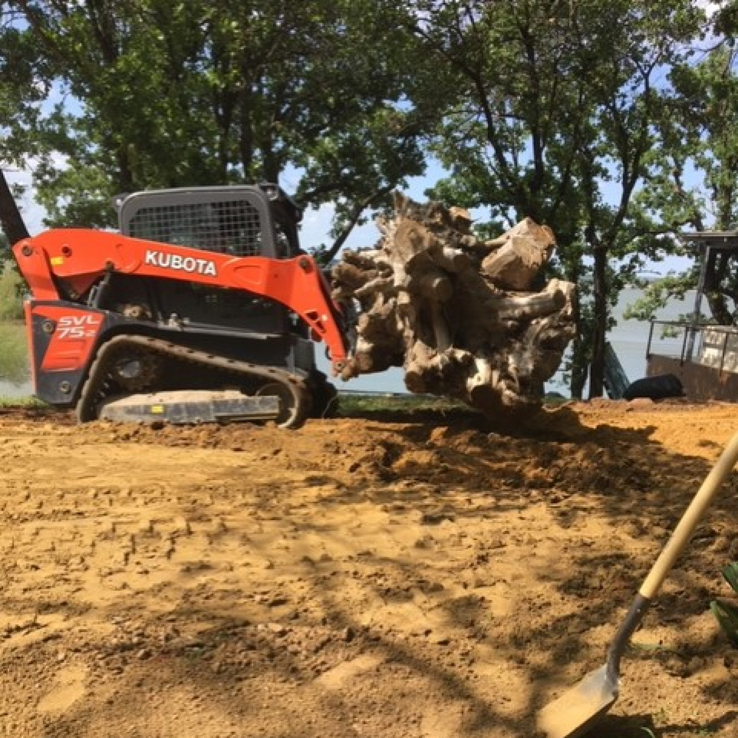Residential lot grading with compact equipment in the Charlotte metro