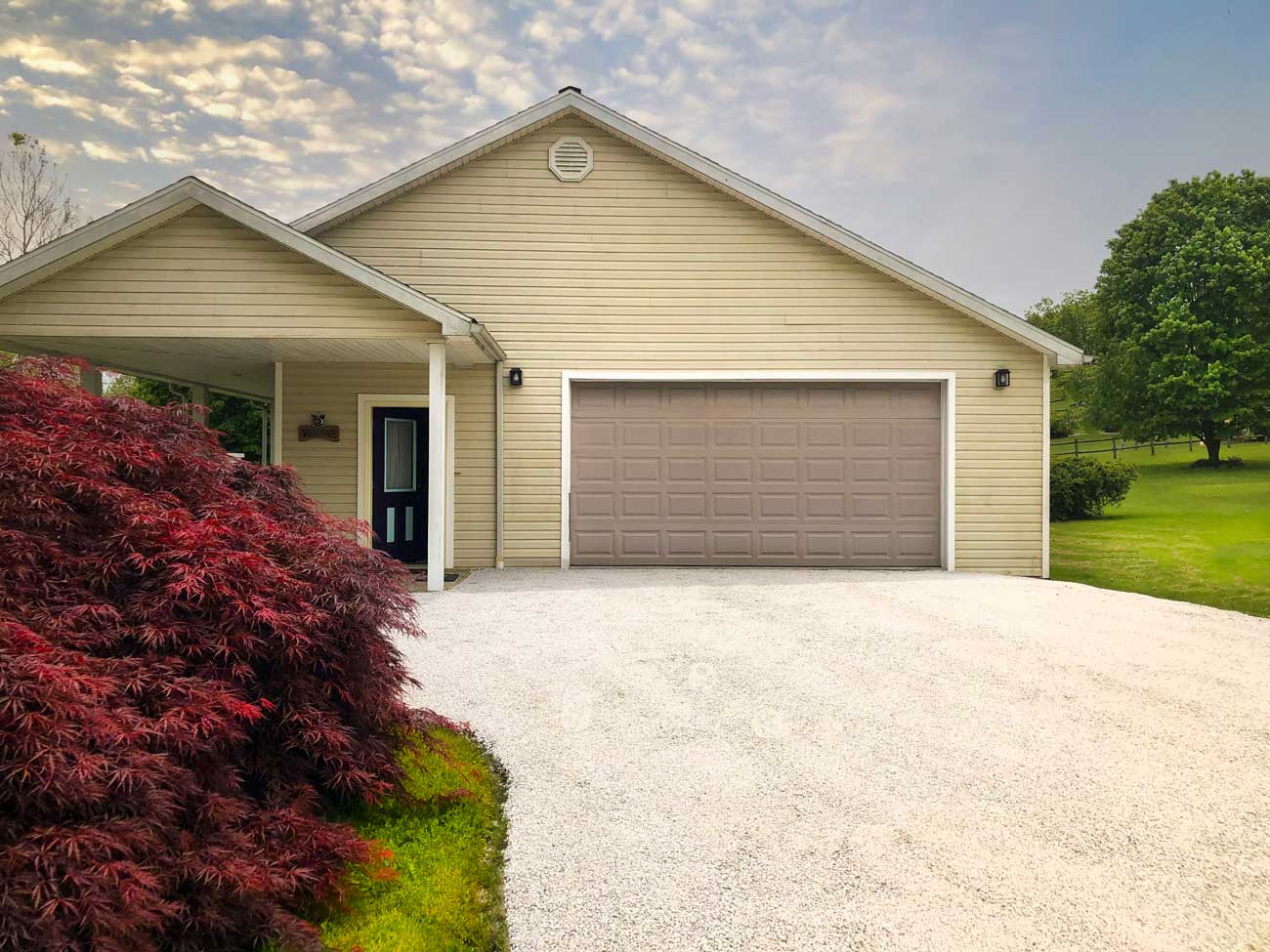 Completed gravel driveway on a residential property in the Charlotte metro
